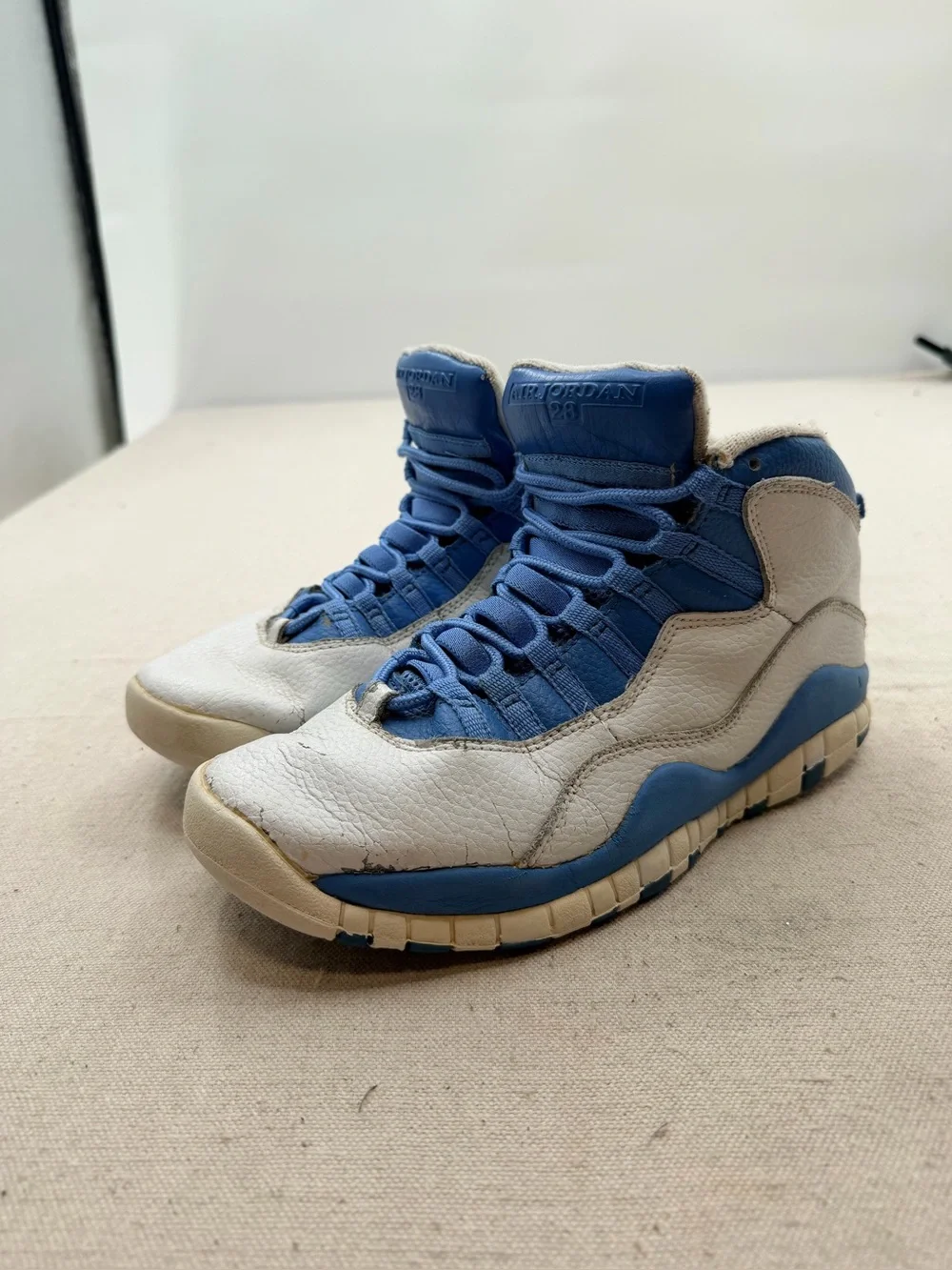 Jordan  White and Blue High-Top Sneakers